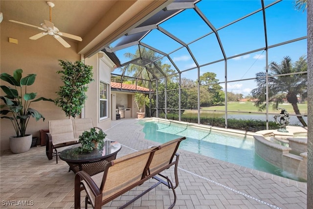 outdoor pool with a patio, outdoor lounge area, a lanai, and a ceiling fan