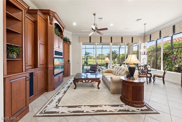 interior space featuring visible vents, ceiling fan with notable chandelier, light tile patterned flooring, crown molding, and recessed lighting