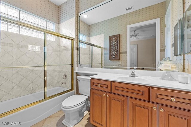 full bathroom with enclosed tub / shower combo, tile patterned floors, visible vents, and wallpapered walls