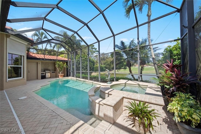 view of pool featuring glass enclosure and a patio