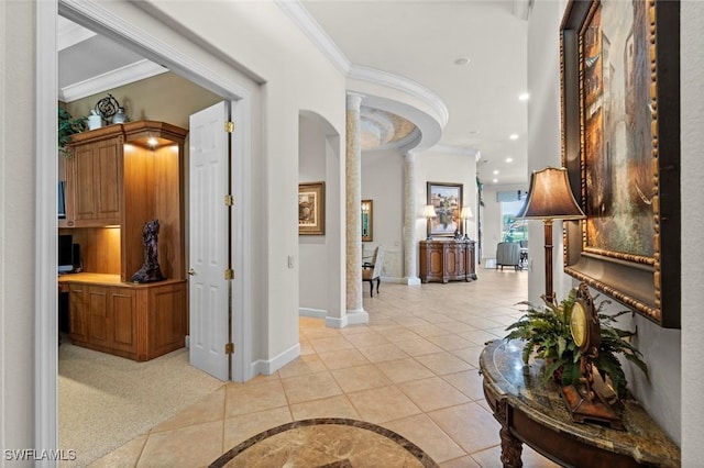 hall with decorative columns, recessed lighting, ornamental molding, light tile patterned flooring, and baseboards