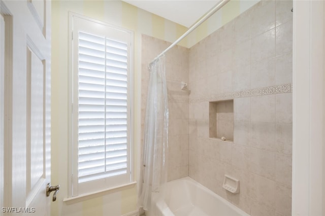 full bath featuring shower / bathtub combination with curtain