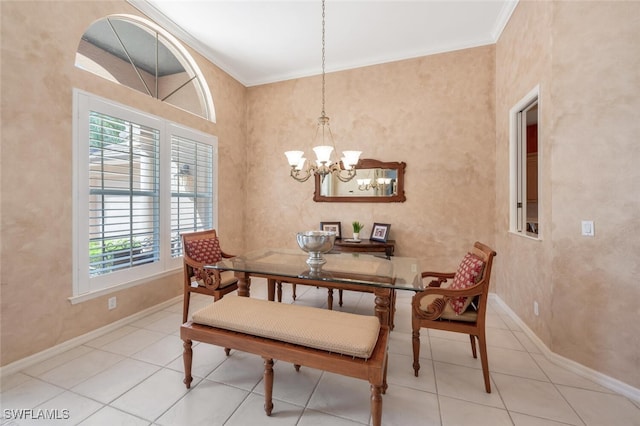 dining space featuring light tile patterned floors, baseboards, ornamental molding, and a chandelier