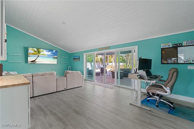 living area with vaulted ceiling, french doors, light wood finished floors, and wooden ceiling