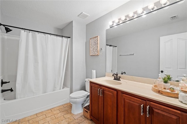 bathroom featuring visible vents, shower / tub combo with curtain, vanity, and toilet