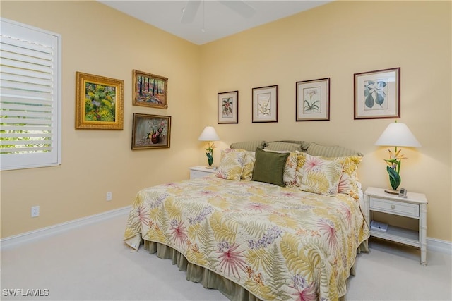 carpeted bedroom with baseboards