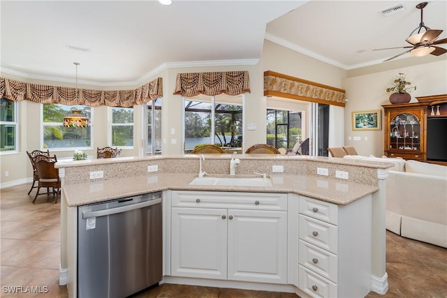 kitchen featuring a sink, visible vents, open floor plan, dishwasher, and plenty of natural light