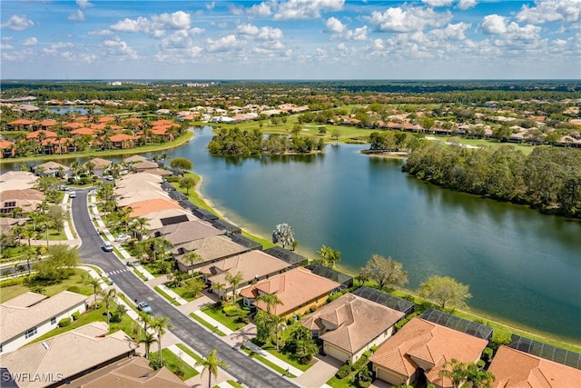 aerial view with a residential view and a water view