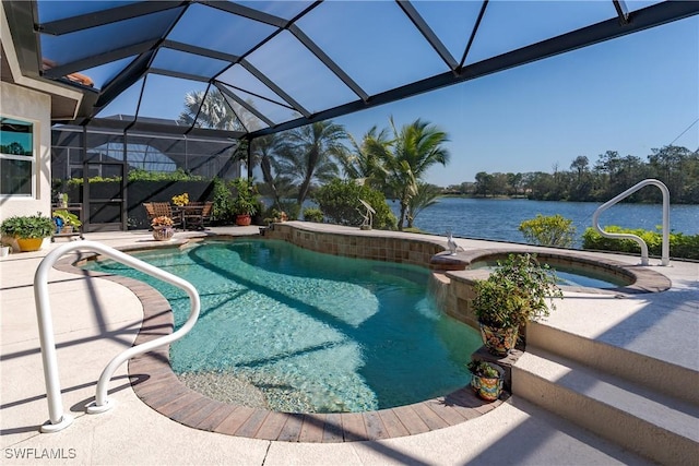 pool featuring a patio, a water view, a lanai, and an in ground hot tub