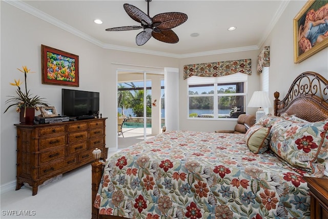 bedroom with carpet, access to outside, multiple windows, and crown molding