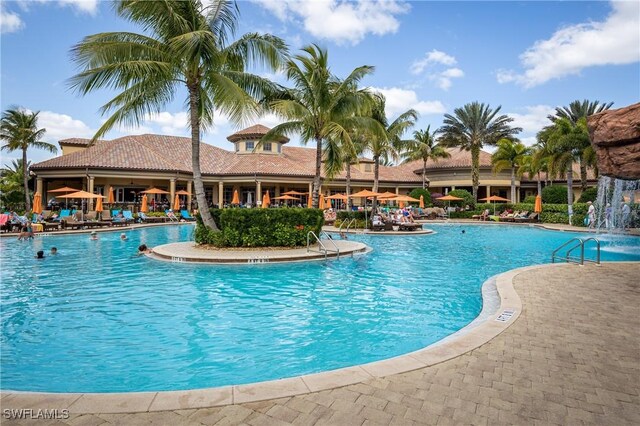 pool with a patio area