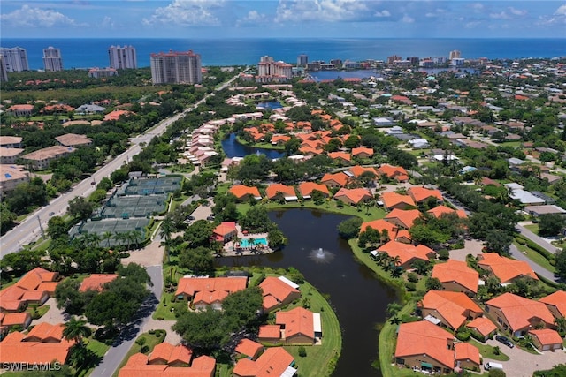 drone / aerial view with a water view