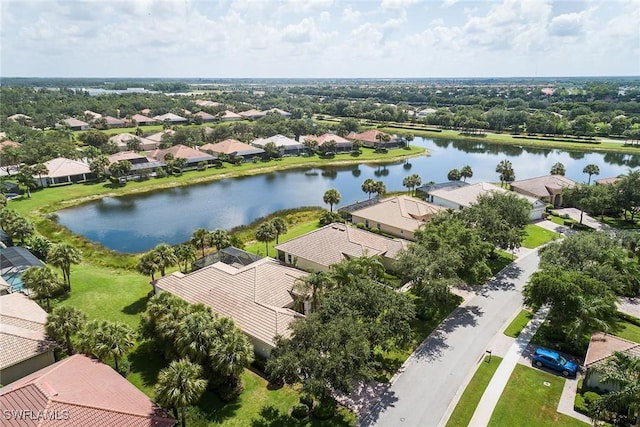 aerial view with a water view and a residential view