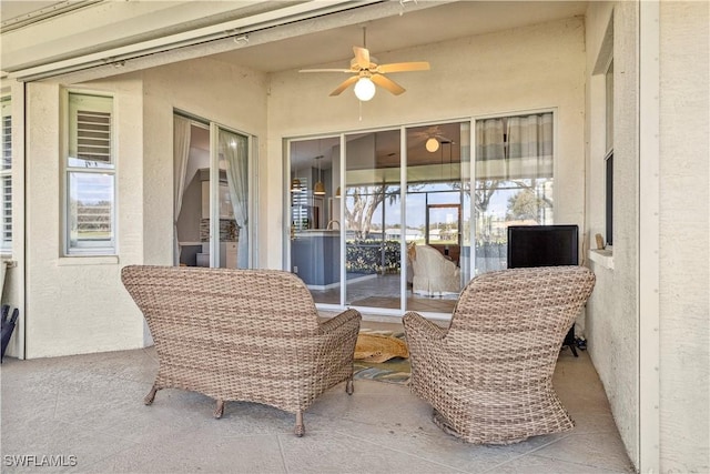 view of patio with ceiling fan