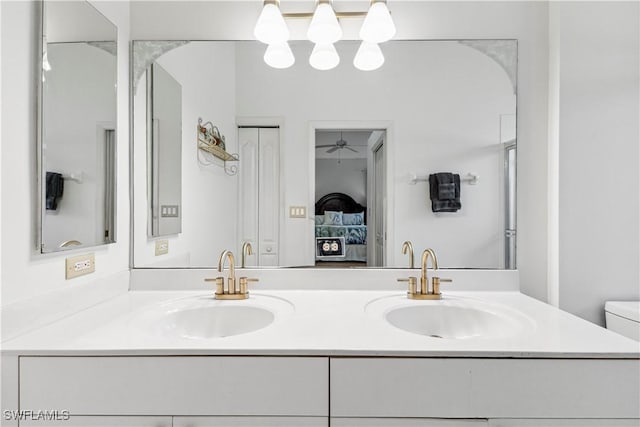 ensuite bathroom with a sink, ensuite bathroom, and double vanity