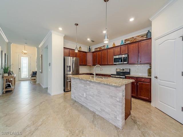 kitchen featuring a sink, ornamental molding, appliances with stainless steel finishes, backsplash, and light stone countertops