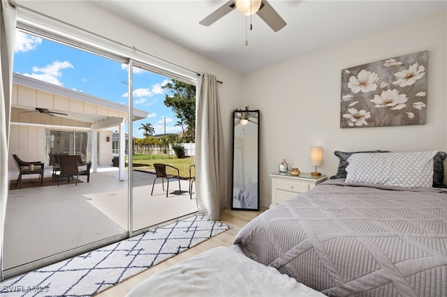 bedroom with light wood-type flooring, access to outside, and a ceiling fan