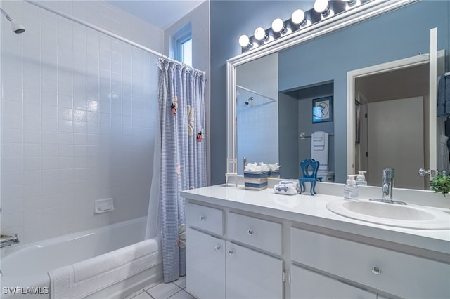 full bath featuring shower / bath combo, tile patterned flooring, and vanity