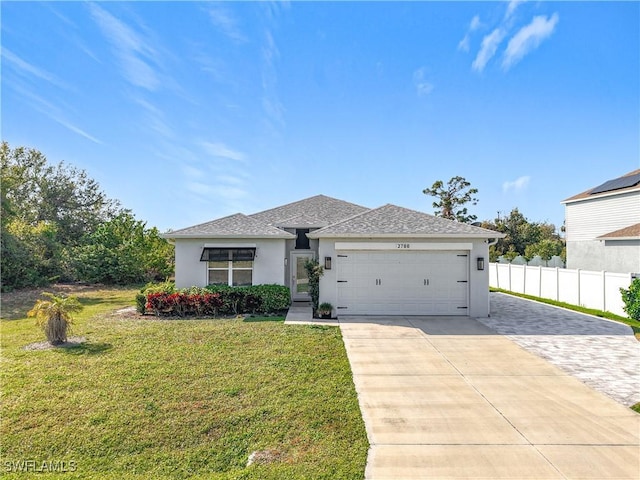 view of front of home featuring stucco siding, concrete driveway, an attached garage, fence, and a front lawn