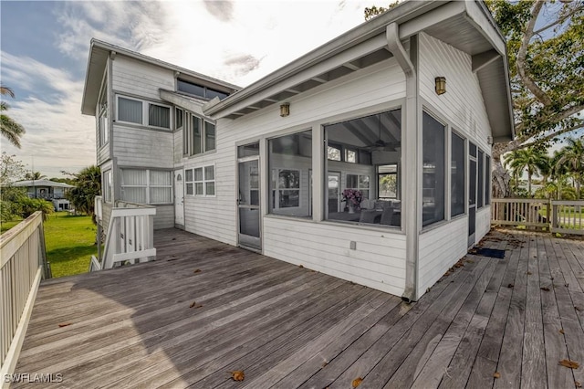 wooden terrace with a sunroom