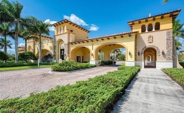 view of property with driveway