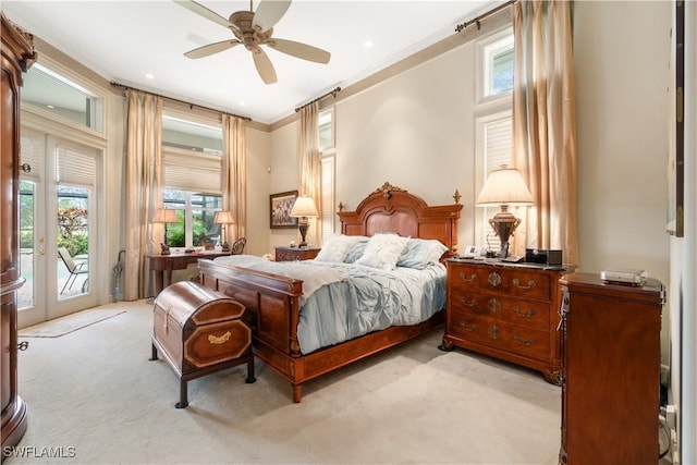 bedroom with light carpet, access to exterior, a ceiling fan, and crown molding