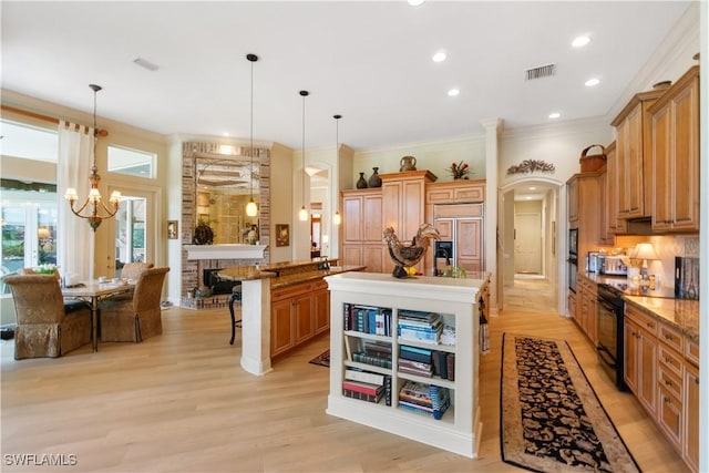 kitchen with a breakfast bar, arched walkways, a fireplace, paneled fridge, and black / electric stove