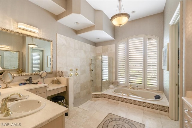 bathroom with a wealth of natural light, vanity, a bath, and walk in shower