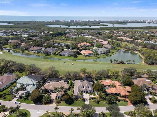 aerial view with a residential view and a water view