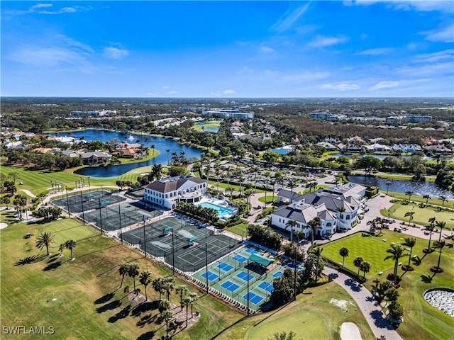 bird's eye view featuring a water view and golf course view