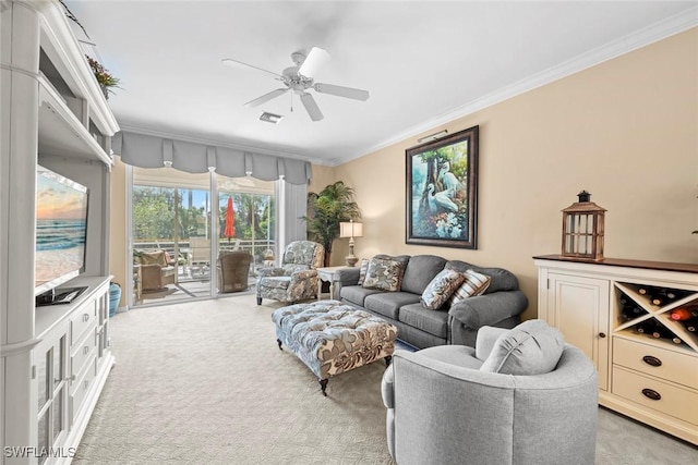 living room with light carpet, ceiling fan, ornamental molding, and visible vents