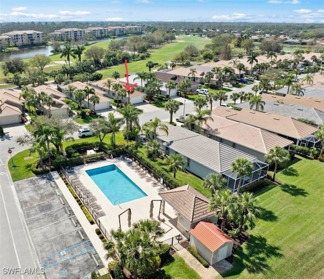 aerial view with a water view and a residential view