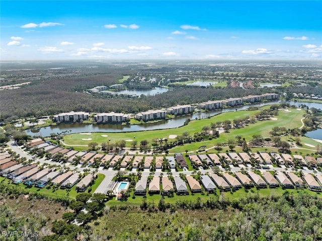 aerial view featuring a residential view, view of golf course, and a water view