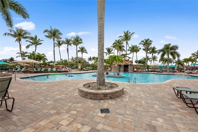 pool featuring a patio area