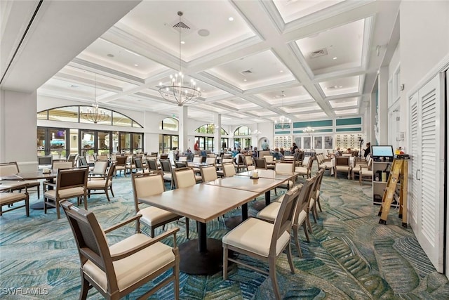 carpeted dining room featuring visible vents, a chandelier, coffered ceiling, and beamed ceiling