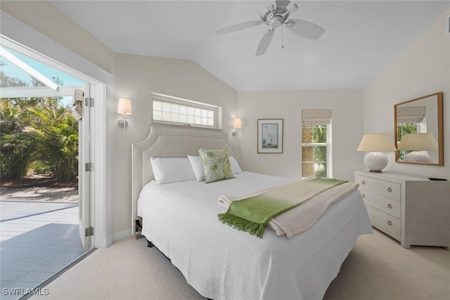 bedroom featuring baseboards, lofted ceiling, ceiling fan, access to outside, and light colored carpet