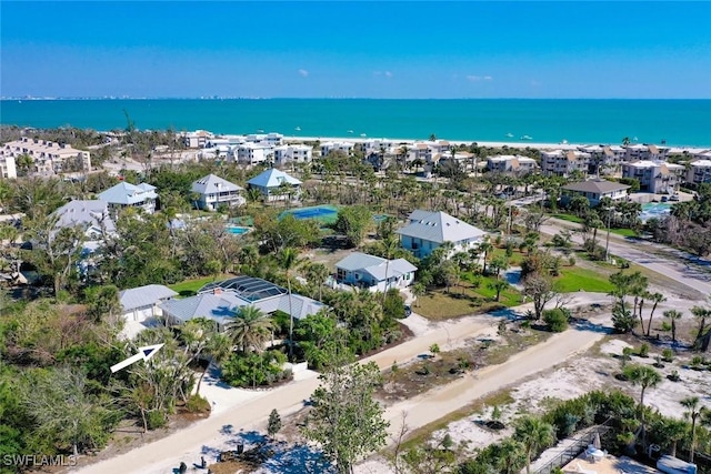 aerial view with a residential view and a water view