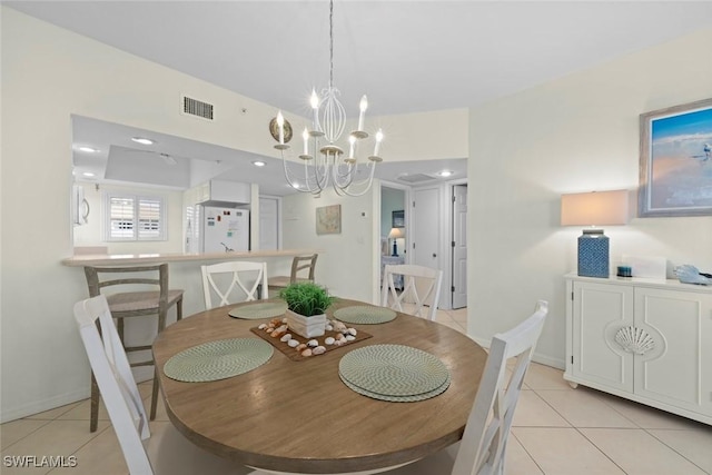 dining space featuring recessed lighting, visible vents, and light tile patterned flooring