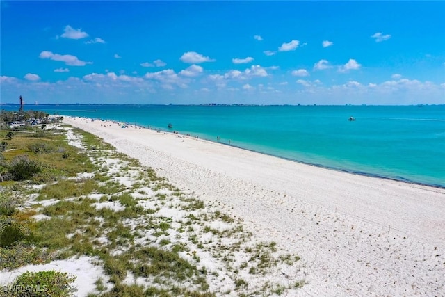 property view of water featuring a beach view