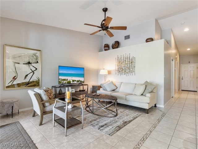 living room featuring high vaulted ceiling, recessed lighting, visible vents, and baseboards