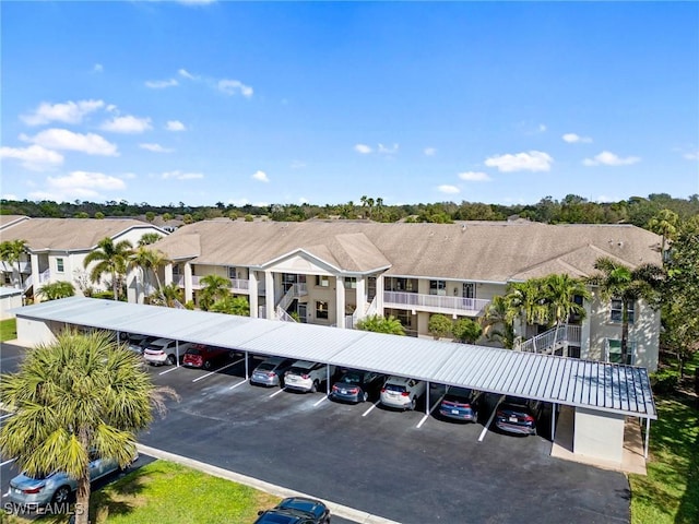 covered parking lot with a residential view