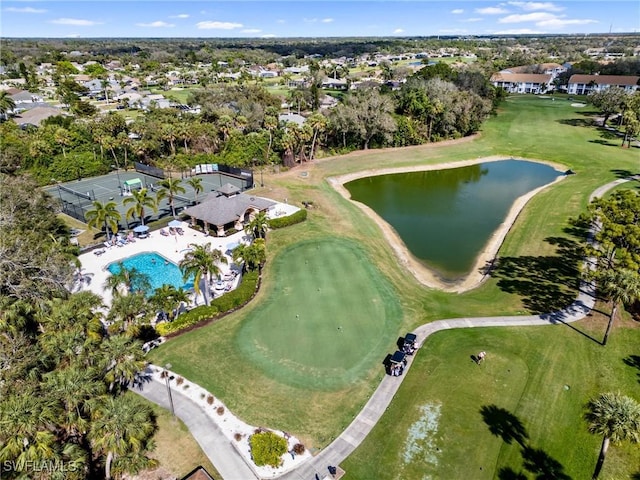 birds eye view of property featuring a water view and golf course view