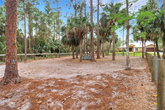 view of yard with fence