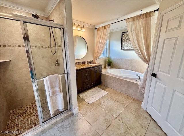 full bathroom with ornamental molding, a stall shower, a garden tub, and vanity