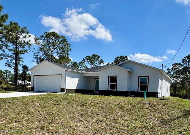 ranch-style house featuring a garage, concrete driveway, a front yard, and stucco siding