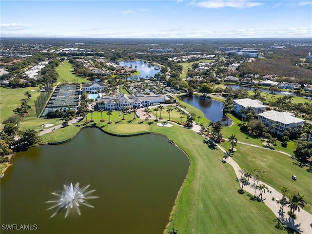 birds eye view of property featuring a water view and view of golf course