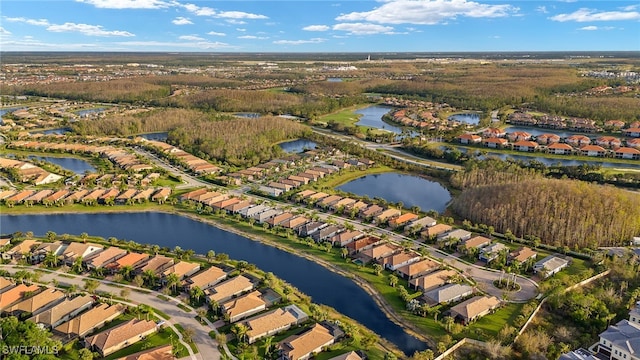 bird's eye view with a water view and a residential view