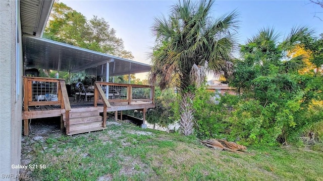 view of yard featuring a wooden deck