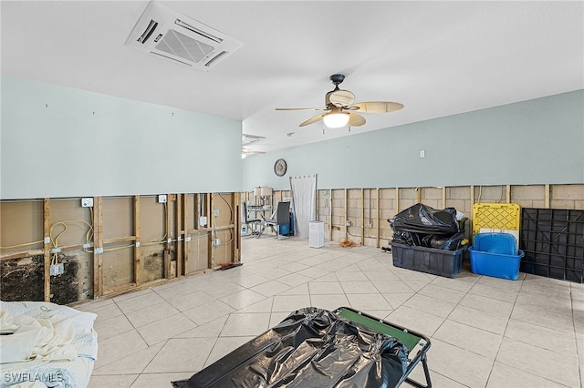 miscellaneous room with a ceiling fan and tile patterned flooring