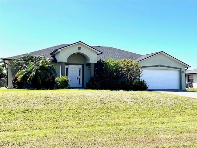 single story home featuring concrete driveway, an attached garage, a front lawn, and stucco siding